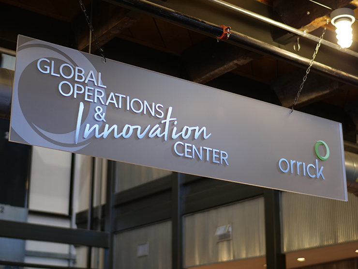 photo of new Global Operations & Innovation sign in Wheeling lobby